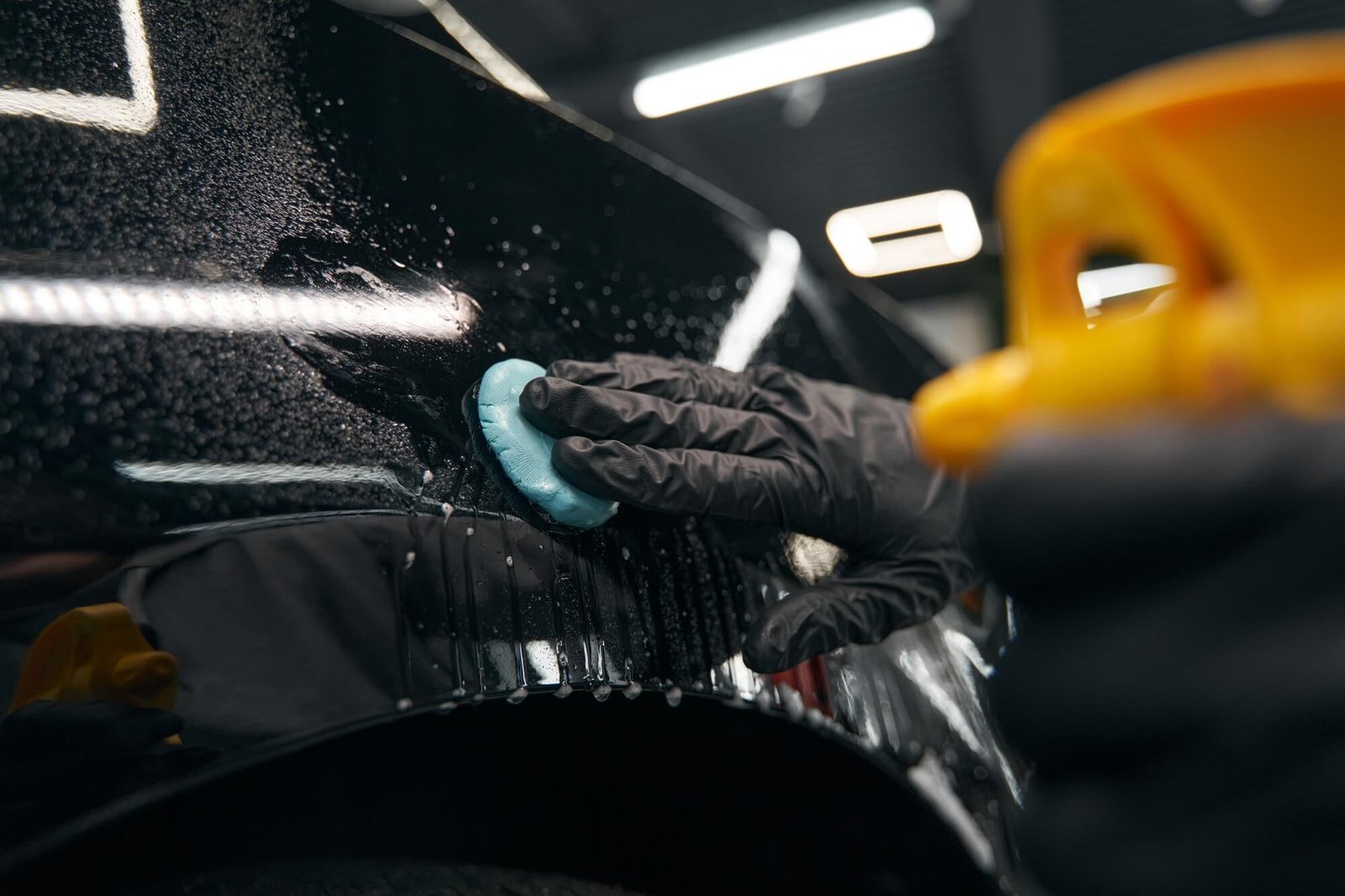 auto-detailing-professional-preparing-automobile-for-polishing.jpg
